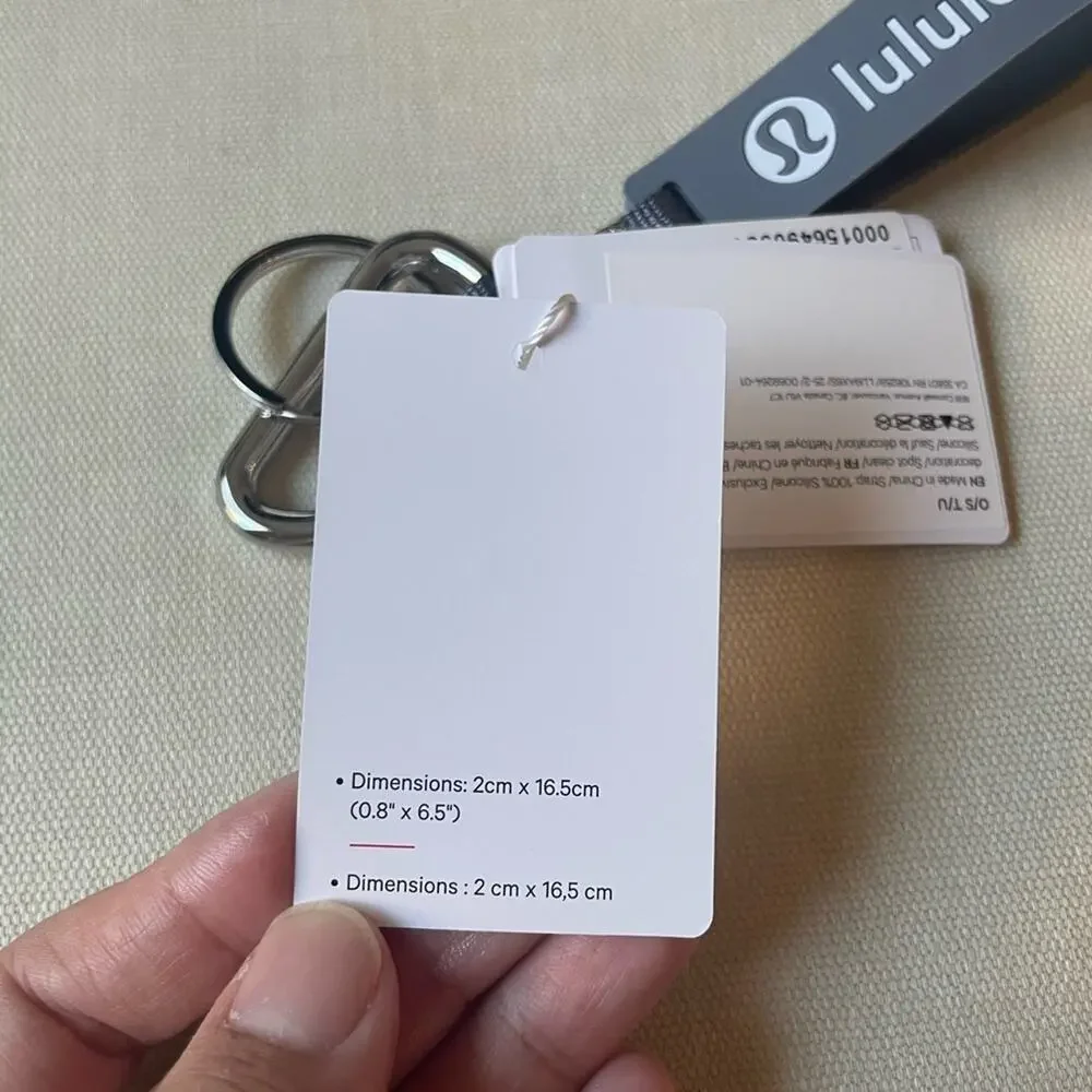 Lululemon silicone keychain - Solar Grey/Starch Blue